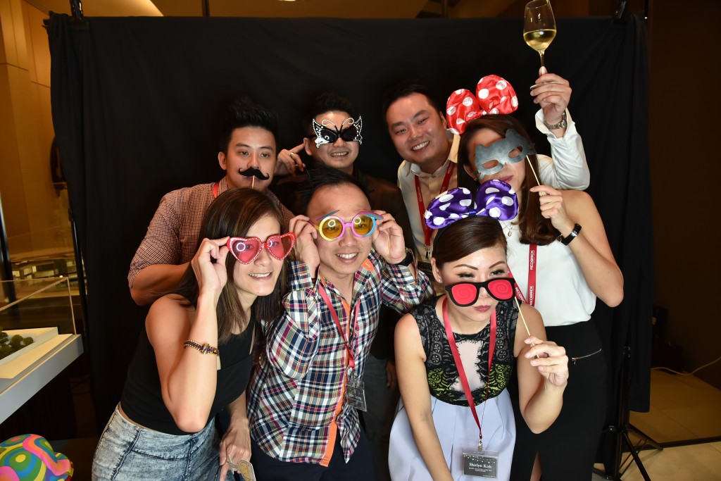 Guests coming together for a shot at the GIF photo booth.